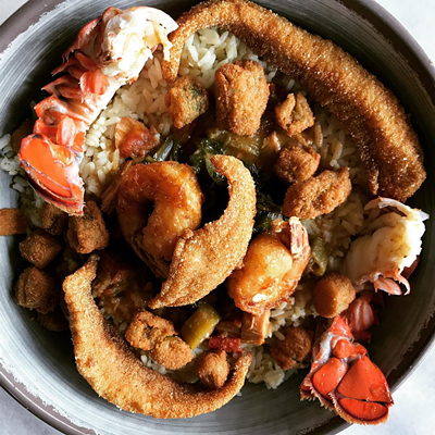 Everything but the Kitchen Sink: Lobster, shrimp, catfish, gumbo, rice, collards, and fried okra.