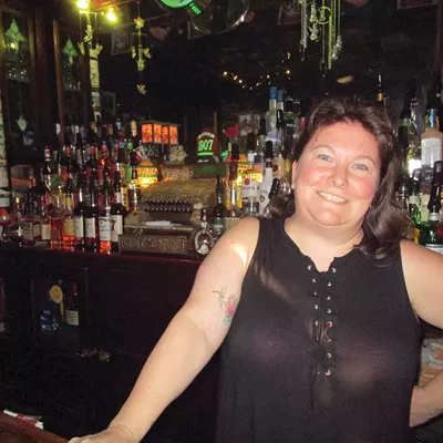 Abick’s resident history expert Kit Lindamood tends the bar on a Saturday afternoon.