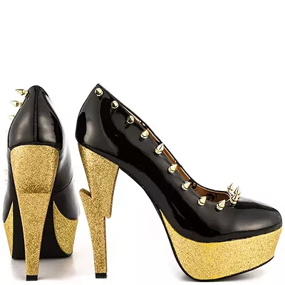 GOLD BOLT HEELS .......... Lightening bolt shaped heel in gold glitter. Shiny black upper with gold spikes along outer side and across the front toe. 5 1/2 inch heel and 1 1/2 inch platform. You wanna inflict some pain? Step on his back with these puppies!
