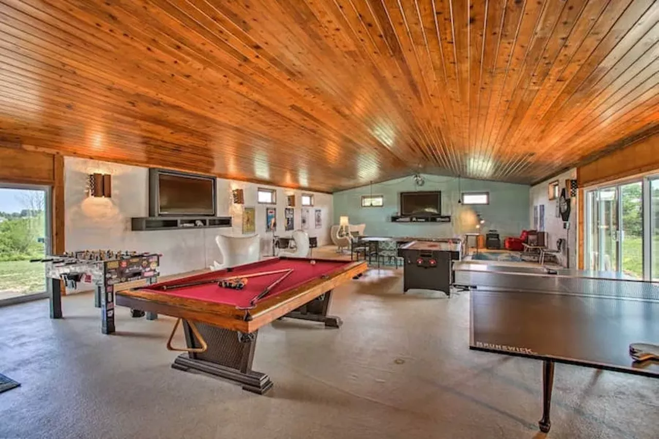 &#146;70s-themed Traverse City shag pad 16 guests, 8 bedrooms, 18 beds, 4 baths $766 per night The &#146;70s Lodge sits on 10 acres and occupies 4,000 sq. ft. of living space, which is decked out in retro furnishings and kitschy touches. The heart of the home is a 1,500-sq. ft. rec room which has two 75-inch flat screens, a hot tub, a sauna, a pool, air hockey, foosball, and ping pong tables. There&#146;s a fire-warmed whiskey bar, too. Each of the home&#146;s bedrooms is themed and transportive. For bad bitches, there&#146;s the Charlie&#146;s Angels room, a 007-themed room, and trekkies can beam themselves to the Star Trek room. Fans of The Partridge Family will feel at home, too, as will anyone who wishes to live out their I Dream of Jeannie fantasy because there&#146;s an incredible room made to feel like Jeannie&#146;s bottle. Oh, and yes there are lava lamps, in case you were worried. Photos via Airbnb.com