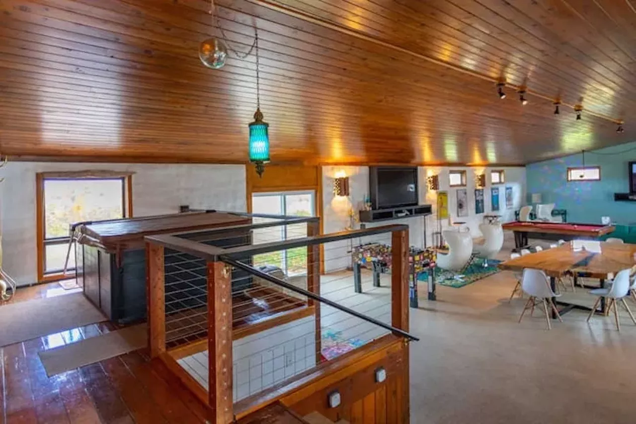 &#146;70s-themed Traverse City shag pad 16 guests, 8 bedrooms, 18 beds, 4 baths $766 per night The &#146;70s Lodge sits on 10 acres and occupies 4,000 sq. ft. of living space, which is decked out in retro furnishings and kitschy touches. The heart of the home is a 1,500-sq. ft. rec room which has two 75-inch flat screens, a hot tub, a sauna, a pool, air hockey, foosball, and ping pong tables. There&#146;s a fire-warmed whiskey bar, too. Each of the home&#146;s bedrooms is themed and transportive. For bad bitches, there&#146;s the Charlie&#146;s Angels room, a 007-themed room, and trekkies can beam themselves to the Star Trek room. Fans of The Partridge Family will feel at home, too, as will anyone who wishes to live out their I Dream of Jeannie fantasy because there&#146;s an incredible room made to feel like Jeannie&#146;s bottle. Oh, and yes there are lava lamps, in case you were worried. Photos via Airbnb.com