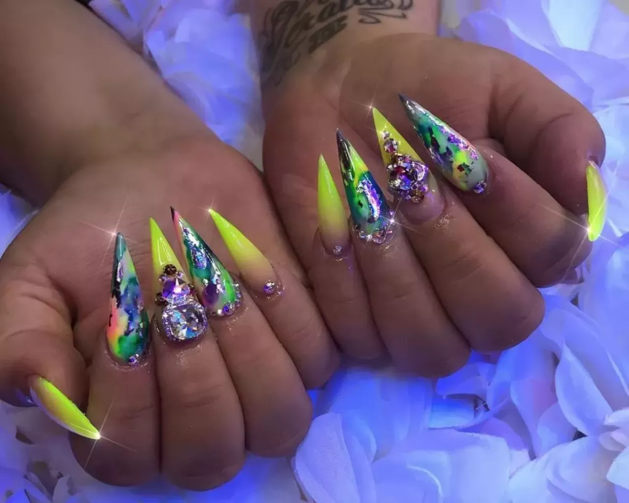 Simply Chic Nails @simplychicnails_ 11 mile & Ryan in Warren Pricilla offers acrylic sets and starts at medium-long length. Most of her beautiful work on her Instagram comes from clients allowing her to do &#147;whatever.&#148; Photo via Simply Chic Nails / Instagram 