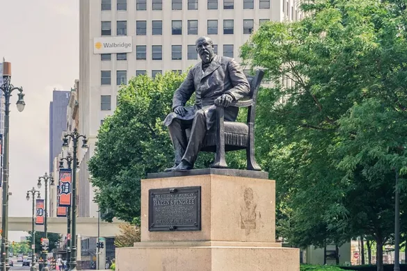 The statue of Hazen Pingree West of Woodward Avenue and south of Adams Street in Grand Circus Park, Detroit Chances are you’ve seen the statue of “Potato Patch Ping” downtown. He’s the businessman who was run for mayor in the 1890s, only to shock his big business backers by winning and promptly becoming a progressive reformer. He was among the first to encourage urban agriculture by allowing Detroiters to use vacant city-owned lots for potato patches during the Panic of 1893. He fought the railroad and electric trusts. He helped establish public transportation in Detroit. He was elected mayor four times and left office only to become governor. The plaque on the statue reads: “He was the first to warn the people of the great danger threatened by powerful private corporations, and the first to awake to the great inequalities in taxation and to initiate steps for reform, and calls him “The Idol of the People.” Photo via CarriedAwayDetroit.com