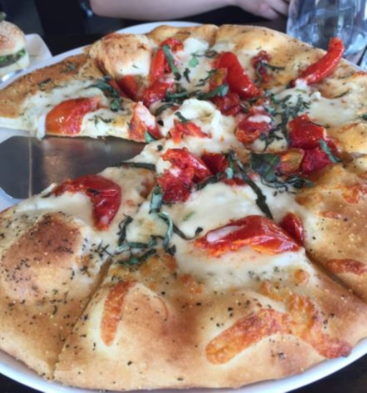 What to order - Pizza Wheel
Get the classic Margherita Pizza, at 14 dollars it's filled with the fresh basics of roasted tomato, fresh burrata cheese, fresh basil and extra virgin olive oil. 
Photo via Jadranka H. 