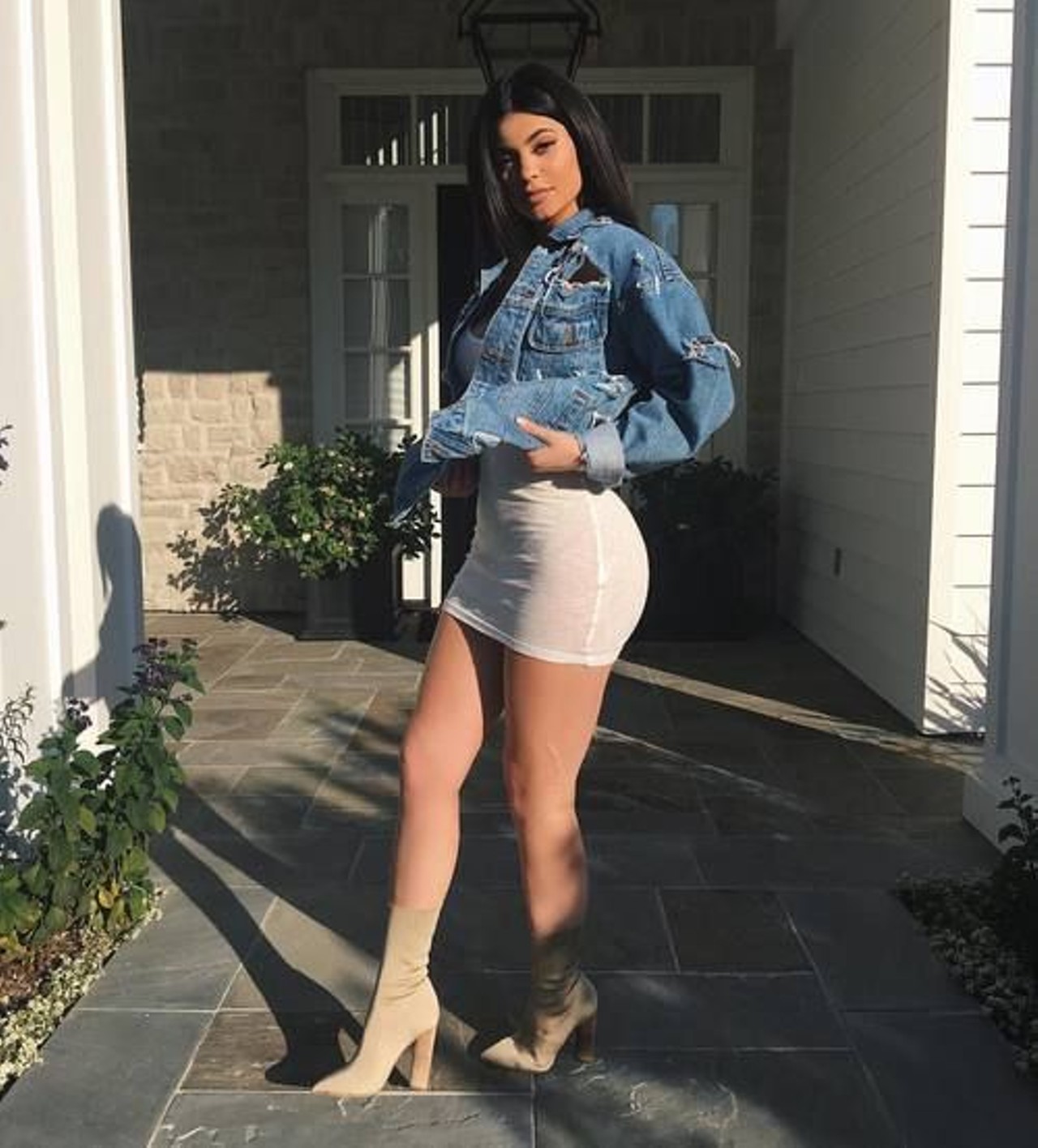 To be the queen of snapchat &#151; Kylie Jenner &#151; you need a jean jacket, a white body-con dress and some fake  &#147;Yeezy&#148; boots like  these Photo courtesy of Instagram 