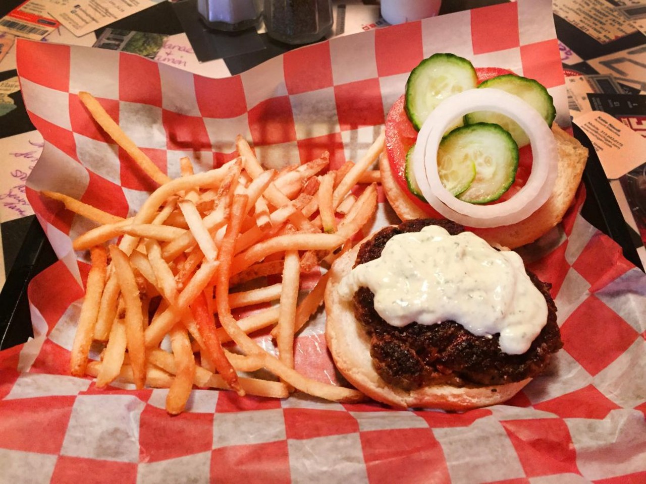 Checker Bar
124 Cadillac Square, Detroit
The Checker Bar's Mount Olympus introduced us to the wonderful concept of a lamb burger. It's made with fresh ground lamb that's stuffed with feta cheese, cucumber, onion, and house made tzatziki sauce.