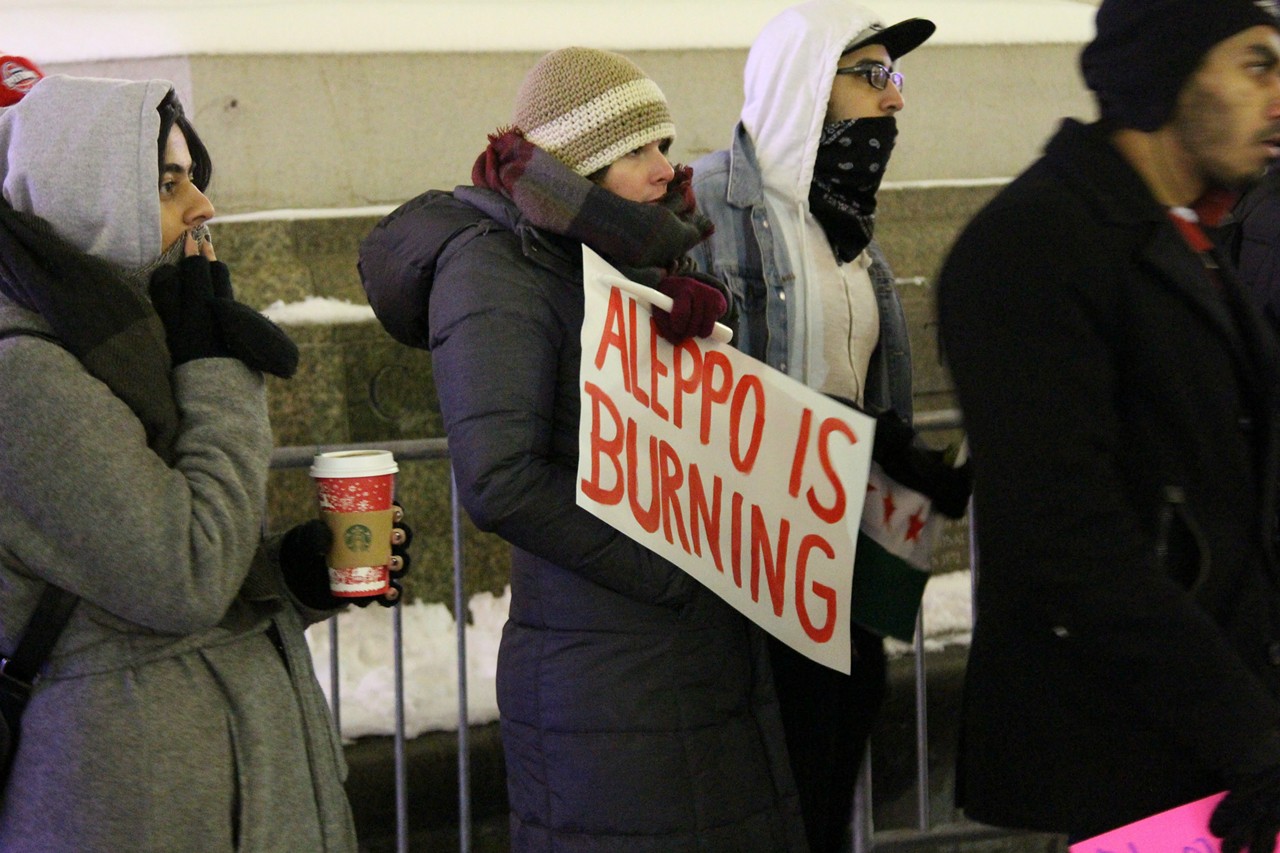 13 photos of WSU's Students Organize for Syria candlelight vigil in Detroit