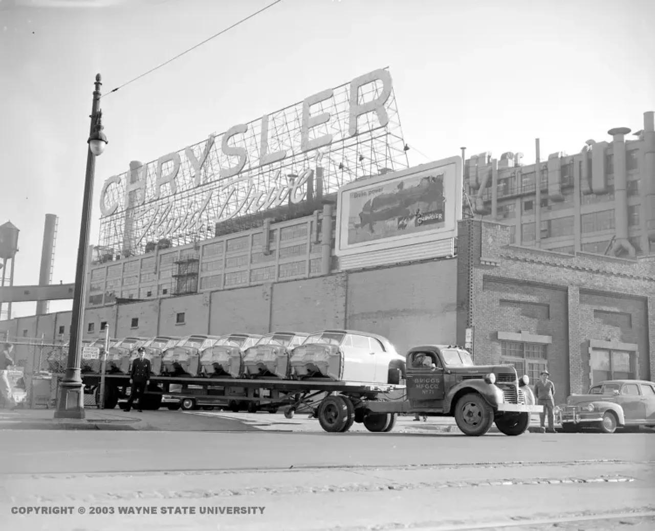 1950 - Chrysler Motor Car Company in Detroit Front view of the Chrysler plant sign.