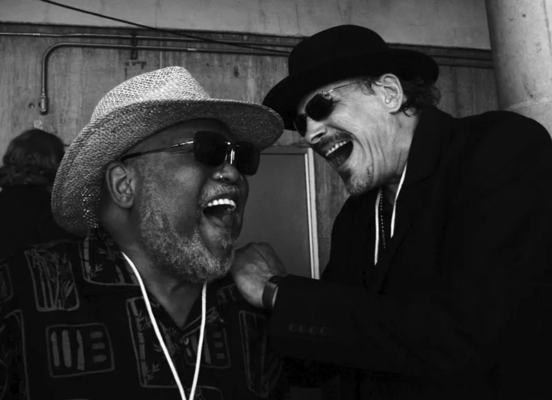 Marcus Belgrave / Jerry Gonzalez Photographer John Osler’s new book Detroit Jazz documents the legacy of local jazz philanthropist Gretchen Valade through a series of pictures taken at Valade’s Dirty Dog Jazz Café in Grosse Pointe Farms, and at the Detroit jazz Festival. Osler has a great eye, the ability to capture a musician mid-feeling.