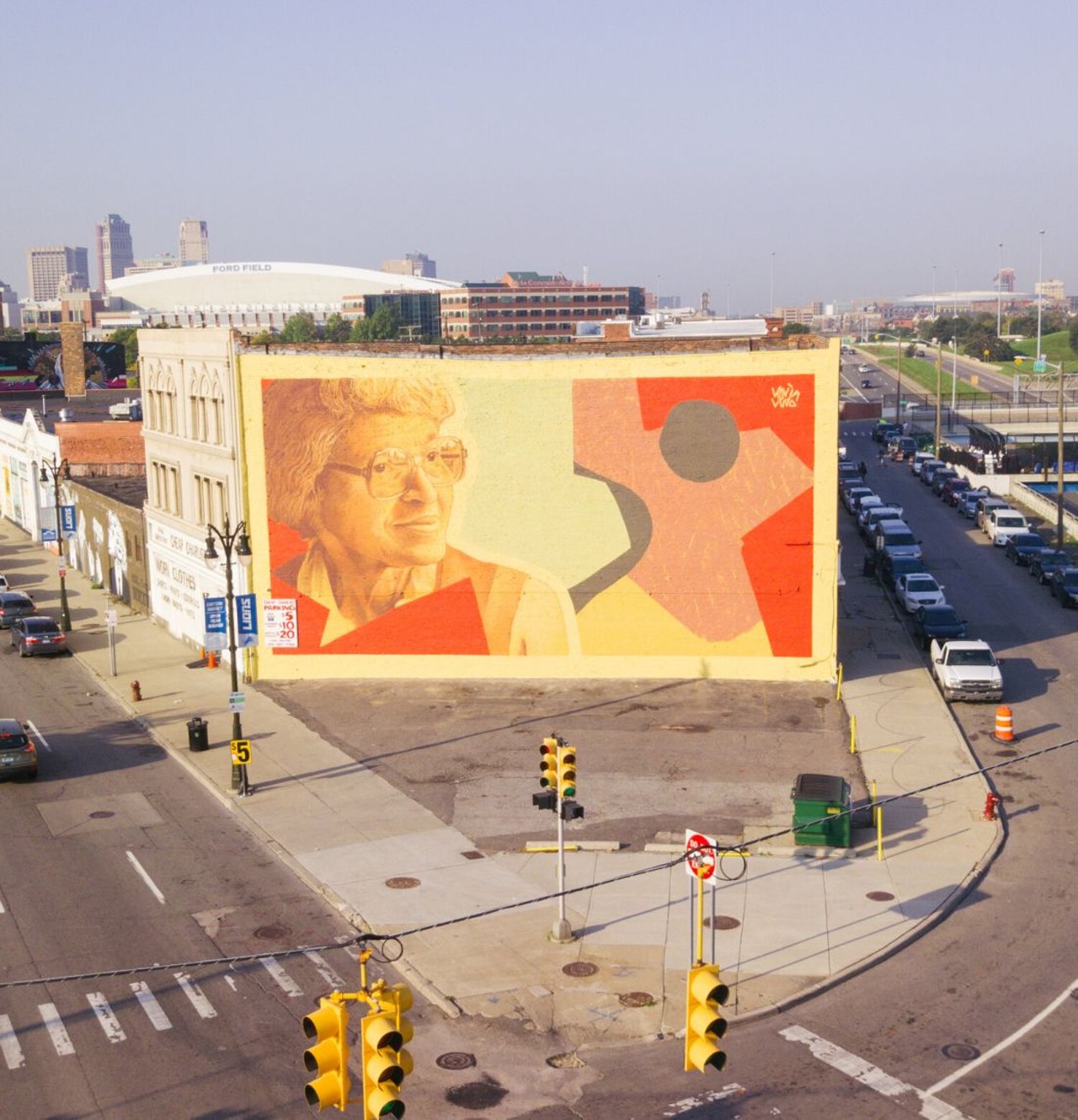 Eastern Market
Russell Street, Detroit
While Eastern Market is a beloved hub for fresh produce, meat, and a weekly slew of local vendors, as well as restaurants and shops, it's also an art destination. Eastern Market is home to Murals in the Market, voted one of the top mural festivals in the world, which invites muralists to turn the Eastern Market area into their canvases, unleashing bold, bright, and powerful murals, most of which can be seen by car.
Mural by Kevin Ledo/Courtesy of Murals in the Market