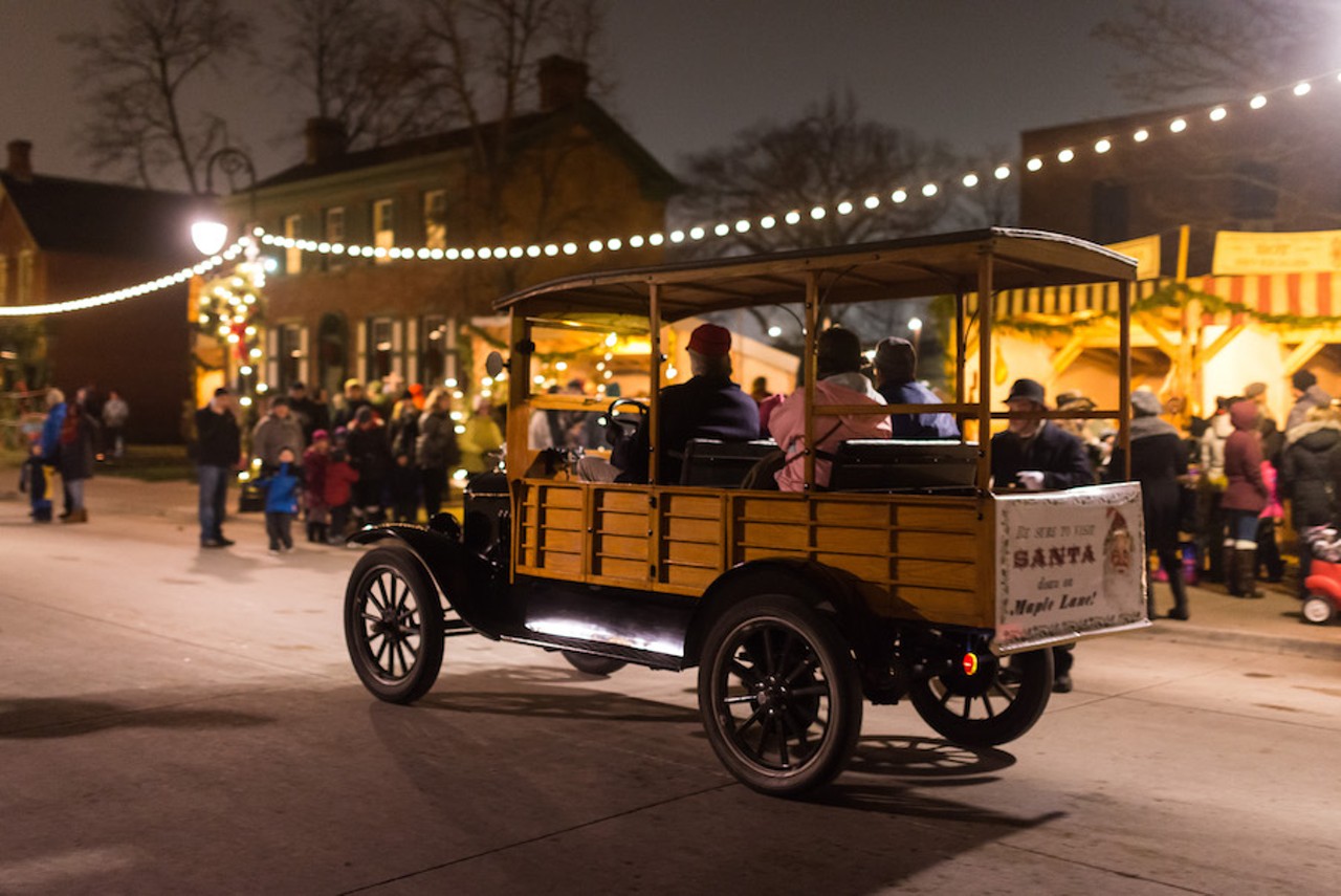 Holiday Nights in Greenfield Village
20900 Oakwood Blvd., Dearborn; 313-982-6001; thehenryford.orggreenfieldvillage; Tickets are $22.50-$30.
No one kicks it old school quite like Greenfield Village, where butter churning and Model Ts are preferred to TikTok and a hands-free Tesla. Keeping with 20 years of old school holiday fun, Greenfield Village reprises its Holiday Nights tradition, though with some tweaks. This year, while attractions and happenings like the Weiser Railroad, ice skating, indoor caroling, outdoor caroling with Santa, the horse-drawn carriage, and Model T rides are cancelled this year, the Greenfield Village grounds will be decked out with holiday decorations with some  holiday vignettes presented in period attire throughout. Oh, and the carousel remains open and free, and there&#146;s talk of some famous reindeer making an appearance. For anyone who may need a sensory-friendly experience, inquire with a team member who can provide such accommodations. Holiday Nights is presented from 6:30 p.m.-10 p.m. and will run Dec. 4-6, 11-13, 15-23, and 26-28. 
Photo by Doug Coombe