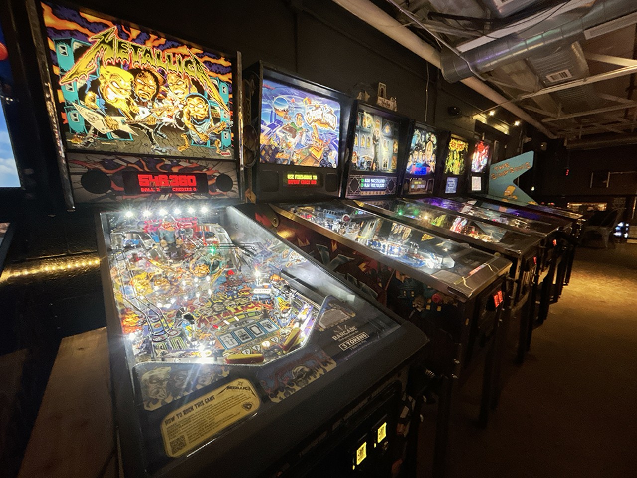 Go to an arcade bar
As long as you don’t buy too many drinks, hitting a bar that also has games is a fun way to enjoy a date and maybe engage in some lighthearted competition too. There are lots of options in Detroit such as Checker Bar, The Yard, Barcade, and more.