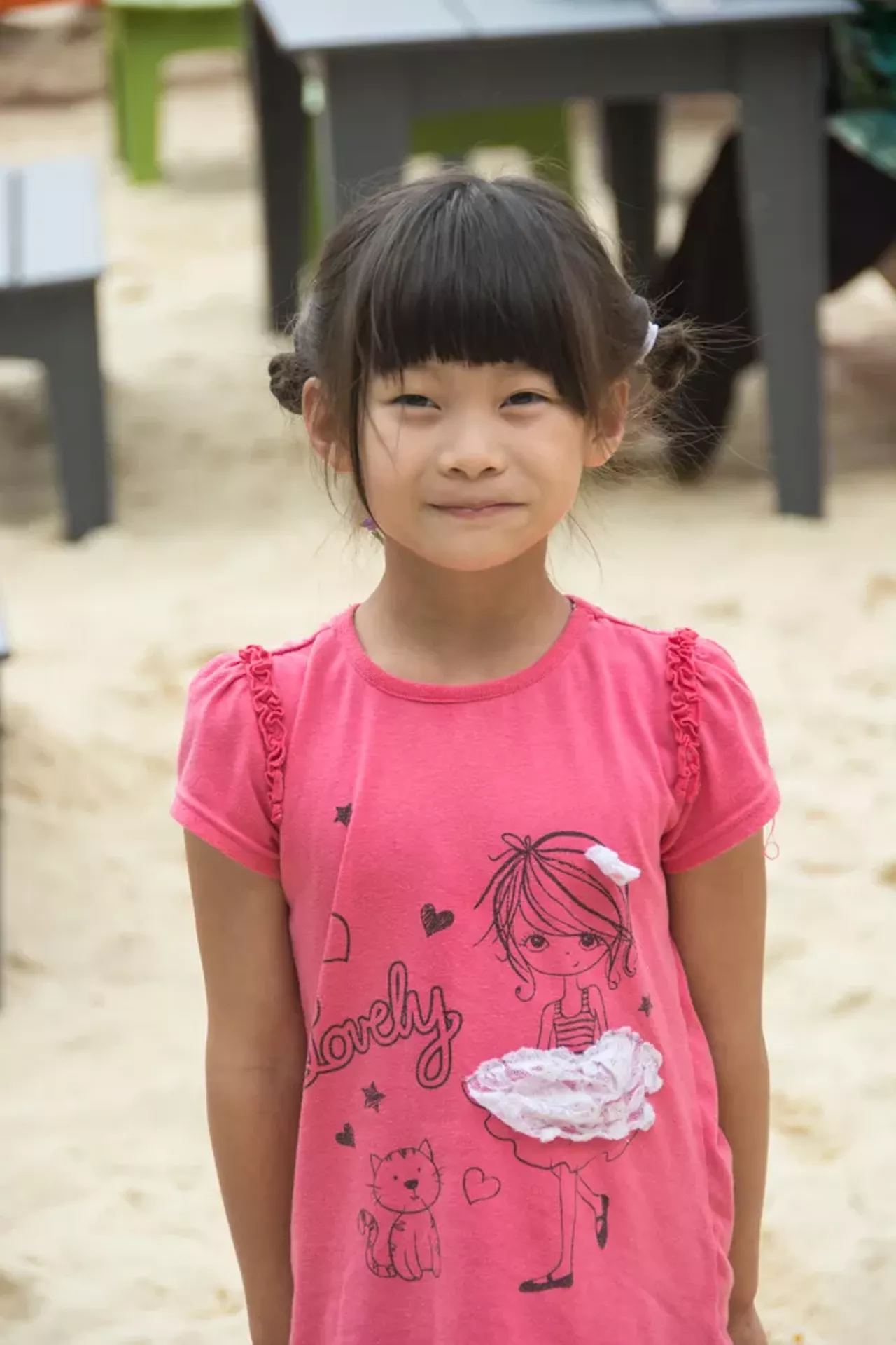 Lilian takes a moment to show us her adorable smile before enjoying the festivities.