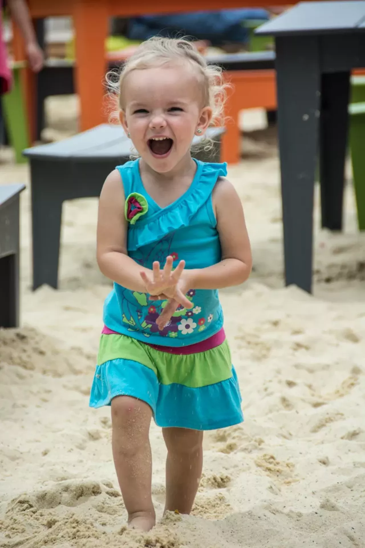Ruby Sanders is having an absolute blast at Jazz Fest, though she needed some time to relax in the sand.