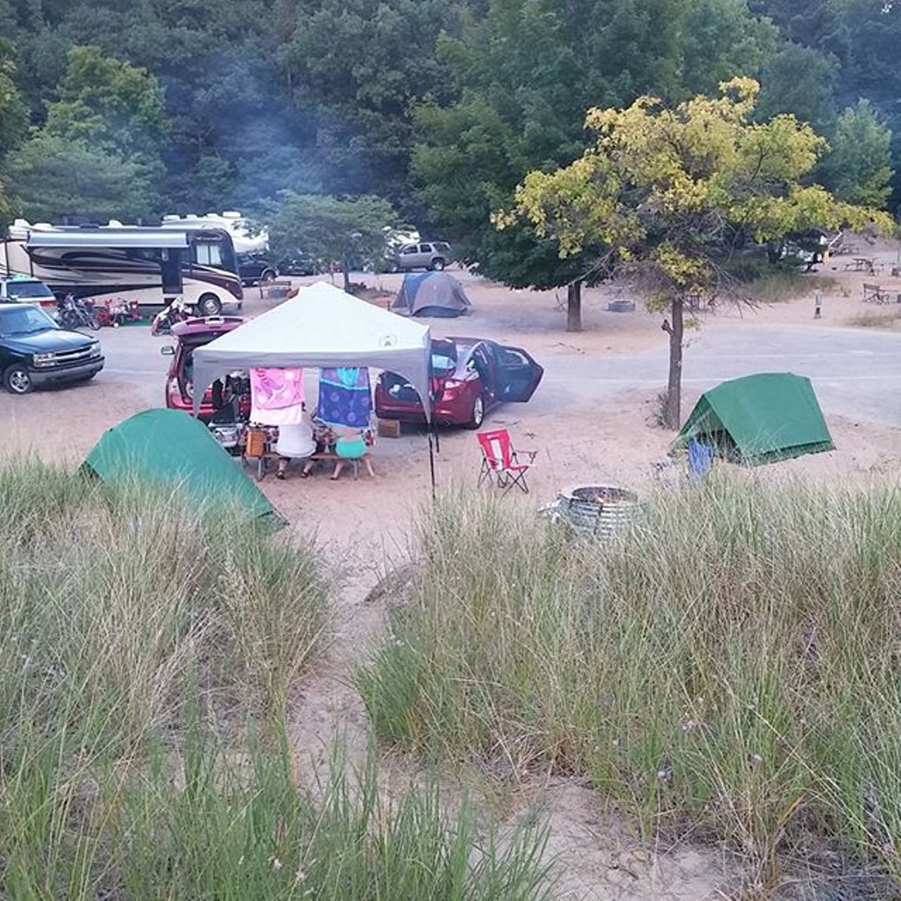 Mears State Park400 West Lowell Street, Pentwater MI, 49449 | 231-869-2051Located in the quaint village of Pentwater along the Lake Michigan shoreline, this campground's paved campsite lots are surrounded by fine sand and a swimming beach is adjacent to the harbor pier. (Photo via Instagram user @triumphdude)