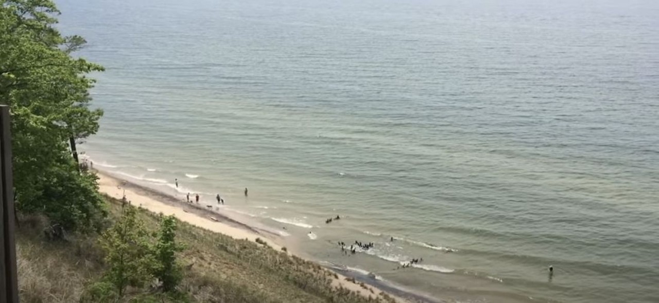 Kirk Park Beach
West Olive; 2 hours, 58 minutes
Comprised of high bluffs and wooded dunes, Kirk Park one of the quieter stretches along Lake Michigan. The water appears endless from its scenic shoreline. Free.
Photo via  Screen Grab/YouTube