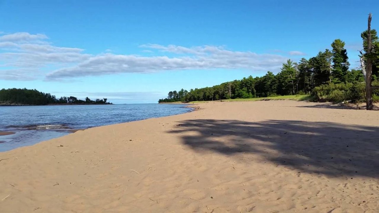 Little Presque Isle
Marquette; 7 hours, 8 minutes
The beach at Little Presque Isle may be among many in this bustling UP city, but it&#146;s lesser known among tourists, making it the perfect place to uproot yourself from civilization. 
Photo via Screen grab/YouTube