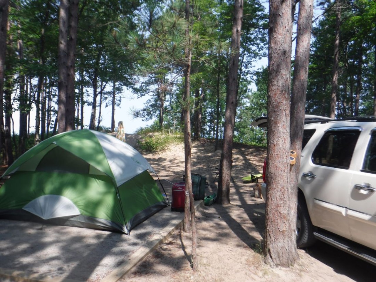 Twelvemile Beach Campground
Grand Marias; 906-387-3700; nps.gov
Located on the Pictured Rocks National Lakeshore, Twelvemile Beach Campground is a bit of a drive but any opportunity to pitch a tent between the tall trees of northern Michigan just steps from the Lake Superior shoreline is absolutely worth the trip.
Photo via nps.gov