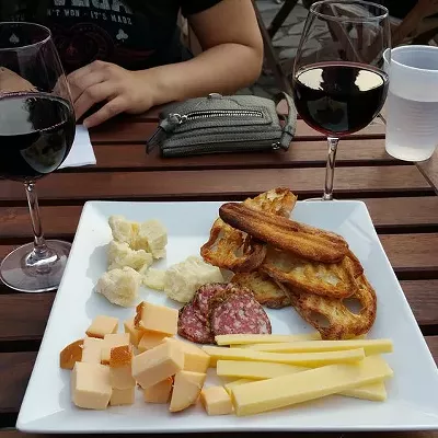 Motor City Wine, 1949 Michigan Ave. You know what they say, nothing cures a hangover like more booze. And lounging about on the patio at this hip wine bar will have you feeling smooth. (Photo via Yelp, Chris M.)