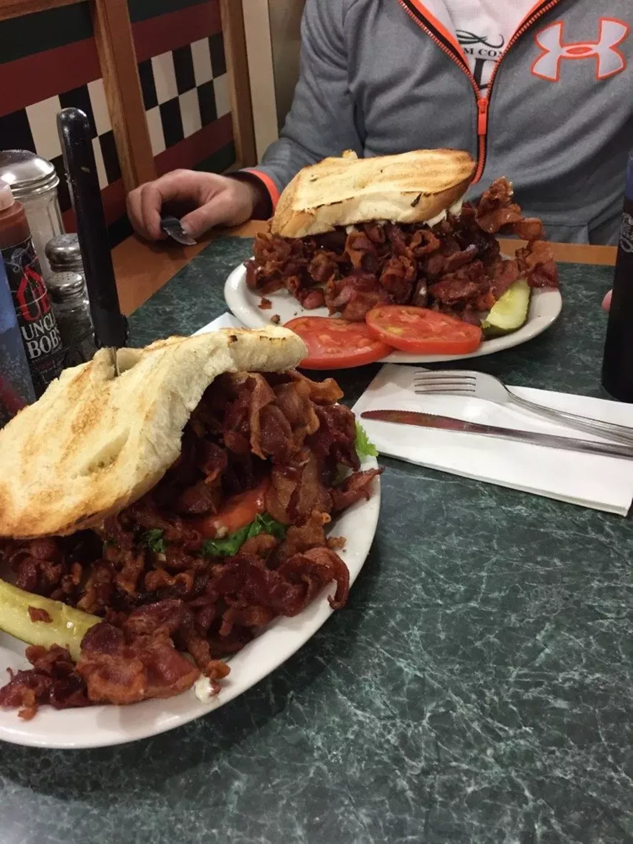 Tony's I-75 Restaurant, 8781 Main Street, Birch Run OK, Tony's is nowhere near downtown Detroit, but it makes the list as a bonus because of one thing: PORTION SIZE. This place is not for the faint of heart- a "side" of bacon takes up a whole plate, and if you're looking for the lettuce on their BLT, you better bring a magnifying glass. For the seriously hungover, come to Tony's for a megadose of greasy goodness. (Photo via Olga T., Yelp)