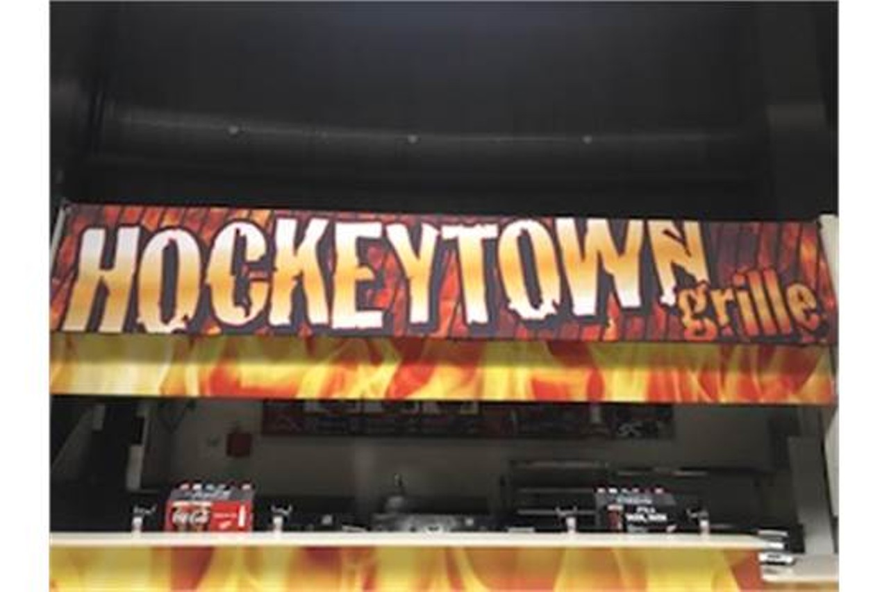 Fabric Hockeytown Grill banner.