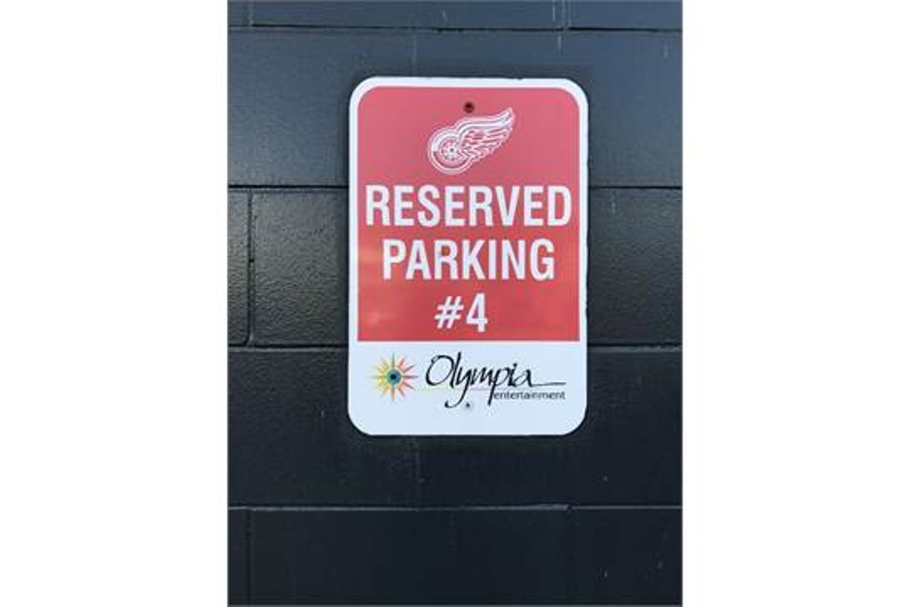 Reserved Olympia parking sign.