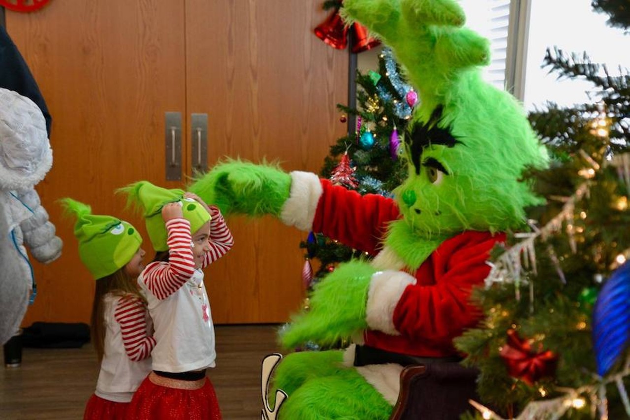 Pictures with the Grinch and letters to Santa at Friendship Park
3380 W. Clarkston Rd., Lake Orion; 248-391-0304 ext. 3500; orionparks.com; Admission is $6-$8.
From 10 a.m.-1:30 p.m. on Saturday, Dec. 12, kids have the opportunity to meet another Christmas icon: the Grinch. The pavilion at Friendship Park will host the Grinch and Santa letter-writing, and a take-home craft station. Each child gets a 15-minute time slot and families are invited to bring their own camera/phone to capture the mean green Christmas-hating machine and, well, you know, your kids doing cute kid stuff. 
Photo via Orion Parks and Recreation/Facebook