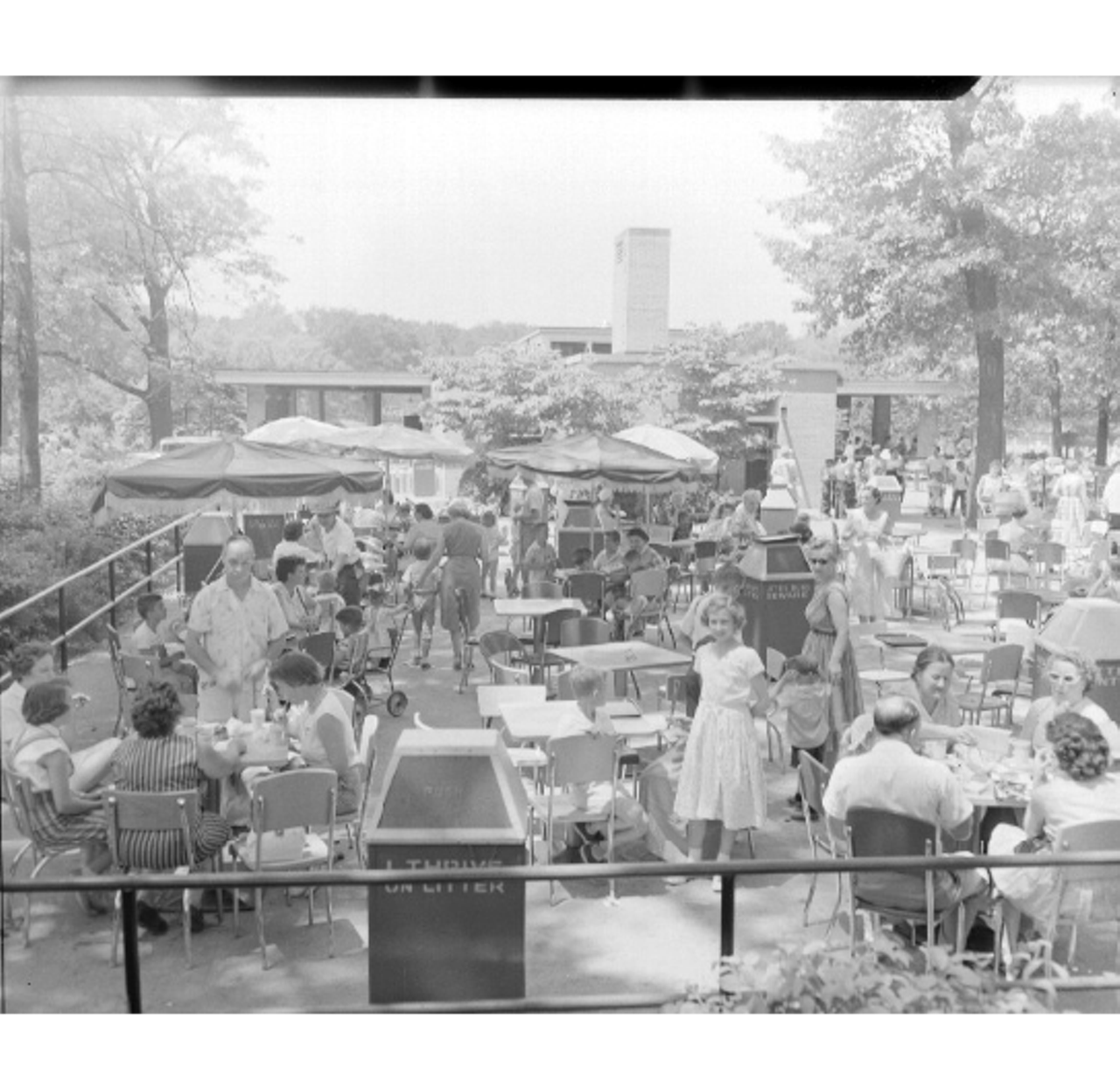 Patrons hanging out at the refreshment stand and terrace. (circa 1958)