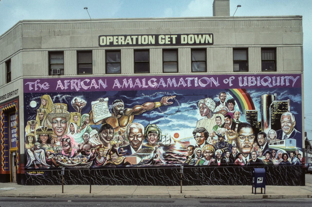 The African Amalgamation of Ubiquity, mural, substance abuse treatment center, Operation Get Down. Painted in 1985 by Curtis Lewis, the panorama represents a view of the history of black people, going back to the Egyptians, and their presence in Detroit, culminating in the portrait of Coleman Young.  9980 Gratiot Ave., Detroit 1995.