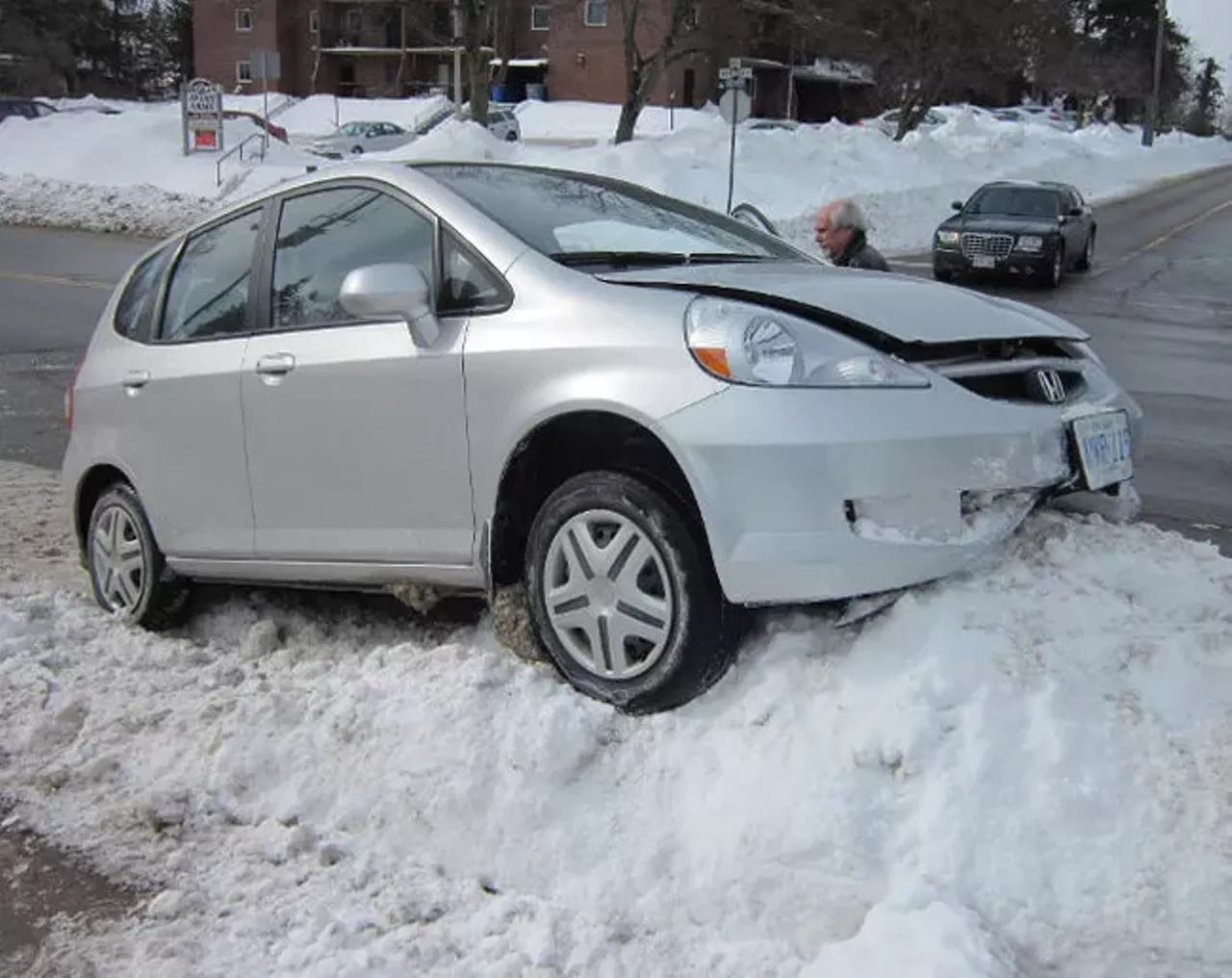  Not knowing whether that's an innocent pile of snow or a curb that'll ruin your tire Everything&#146;s covered in snow. There&#146;s a lump here, a pile there, who knows what&#146;s what. Photo via SimcoeReformer.ca