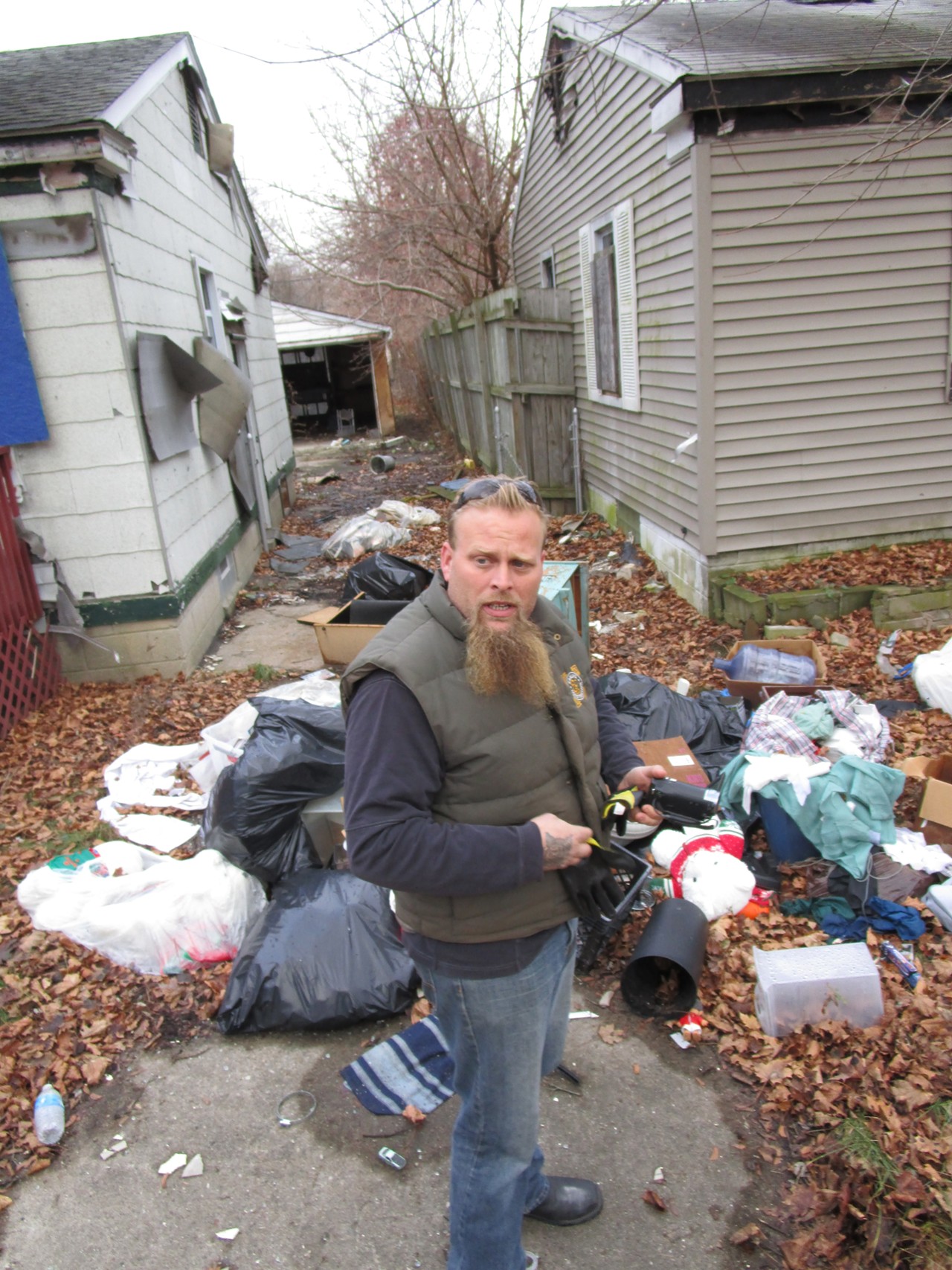 He's looking for mail pieces, bills, order forms, anything with an address. Often, people dumping are in too big a hurry to cover their tracks.