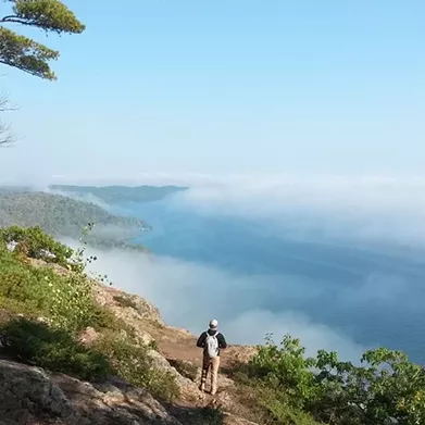 Lac La Belle, Grant Township, Michigan Lac La Belle doubles as a lake and a small community. With actual mountains surrounding the town, it&#146;s a popular place to hike in the summer and snowboard in the winter, and no matter what, capture unparalleled views. (Photo via Instagram, @zachjordan_)
