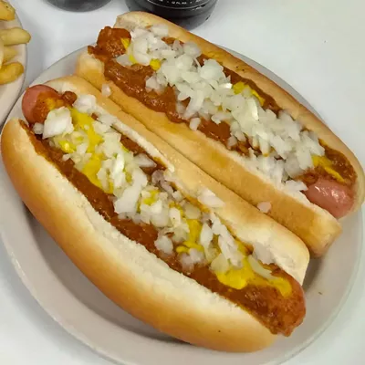 Coney Dog Nothing screams Detroit more than a coney dog. The slightly gross pile of chili and onions on top of a hot dog is a Detroit delicacy to locals and visitors. What to wear: A hot dog costume with extra mustard, plus added chili and onions. How to act: Argue passionately about which Coney Island is the best. 