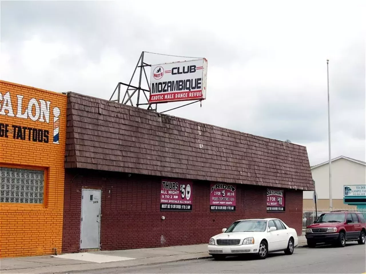 Watts Club Mozambique Jazz club-turned-exotic male dance club-turned-ash and rubble-turned parking lot? Sounds like the beloved Watts Club Mozambique, which was established in 1969 by Cornelius Watts and fell victim to a fire that destroyed the club beyond repair in 2015. In its earliest incarnation, Watts Club Mozambique was a venue for acts like Lonni Smith, the O'Jays, Grant Green, and Peabo Bryson, and when jazz failed to keep the doors open in the 1980s, Watts decided to flip the club into a male strip club aimed at attracting the city's thirsty women. Thankfully, Watts Club Mozambique left behind a trove of incredible TV commercials for which we are eternally grateful. Photo courtesy of the Music Origins Project