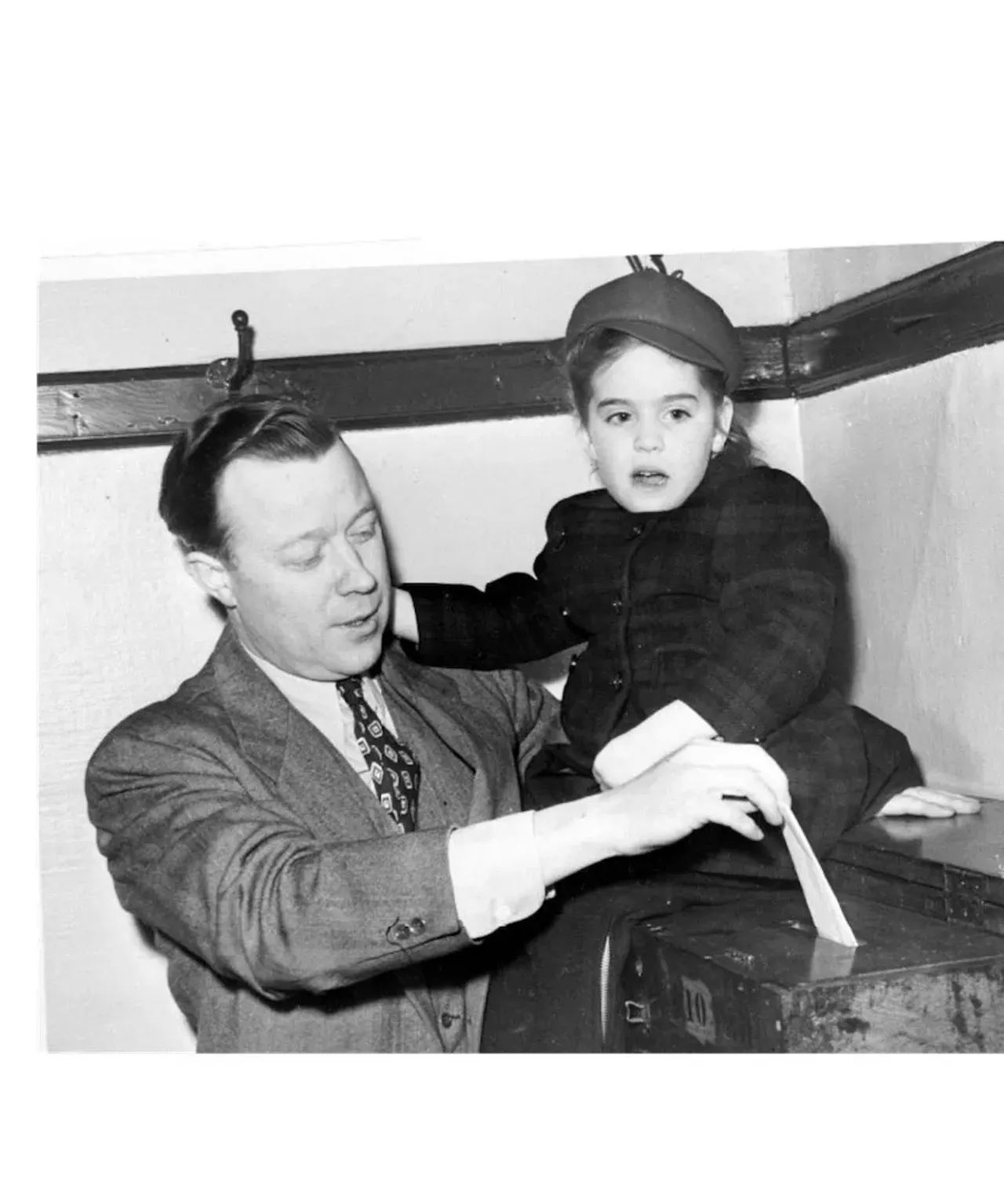 Labor leader Walter P. Reuther voting with daughter Linda. (1947) All photos courtesy of Walter P. Reuther Library, Archives of Labor and Urban Affairs, Wayne State University