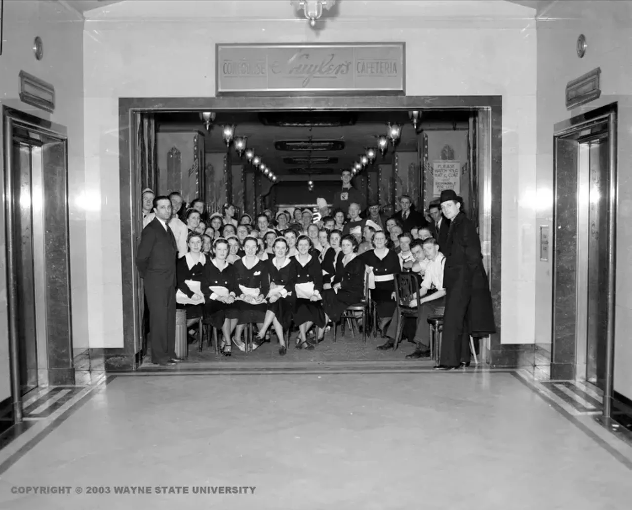 1930s | Large group of primarily female restaurant workers participate in sit-down strike at Huyler's Restaurant in Detroit, Michigan.
