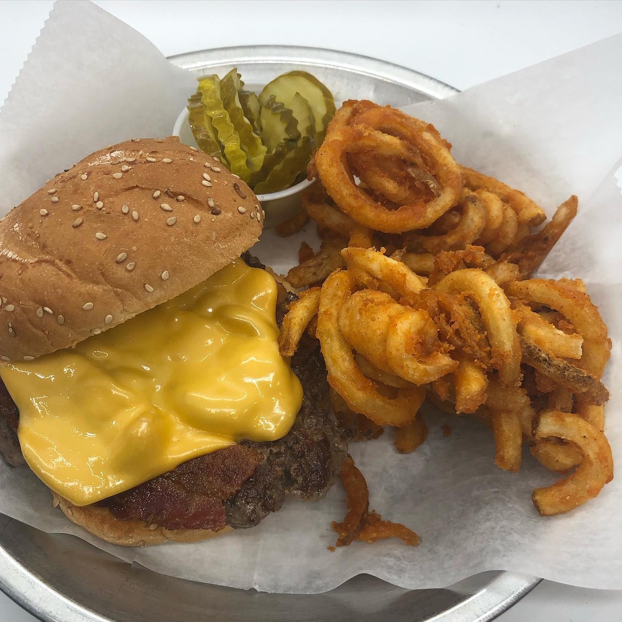 Kozy Lounge
150 E. 10 Mile Rd., Hazel Park; kozylounge.com
Kat Burger: A beef patty topped with fresh jalapeños, crispy bacon, Swiss cheese, and honey. 
Kozy Burger: A beef patty topped with grilled onion, bacon, and Swiss cheese.  