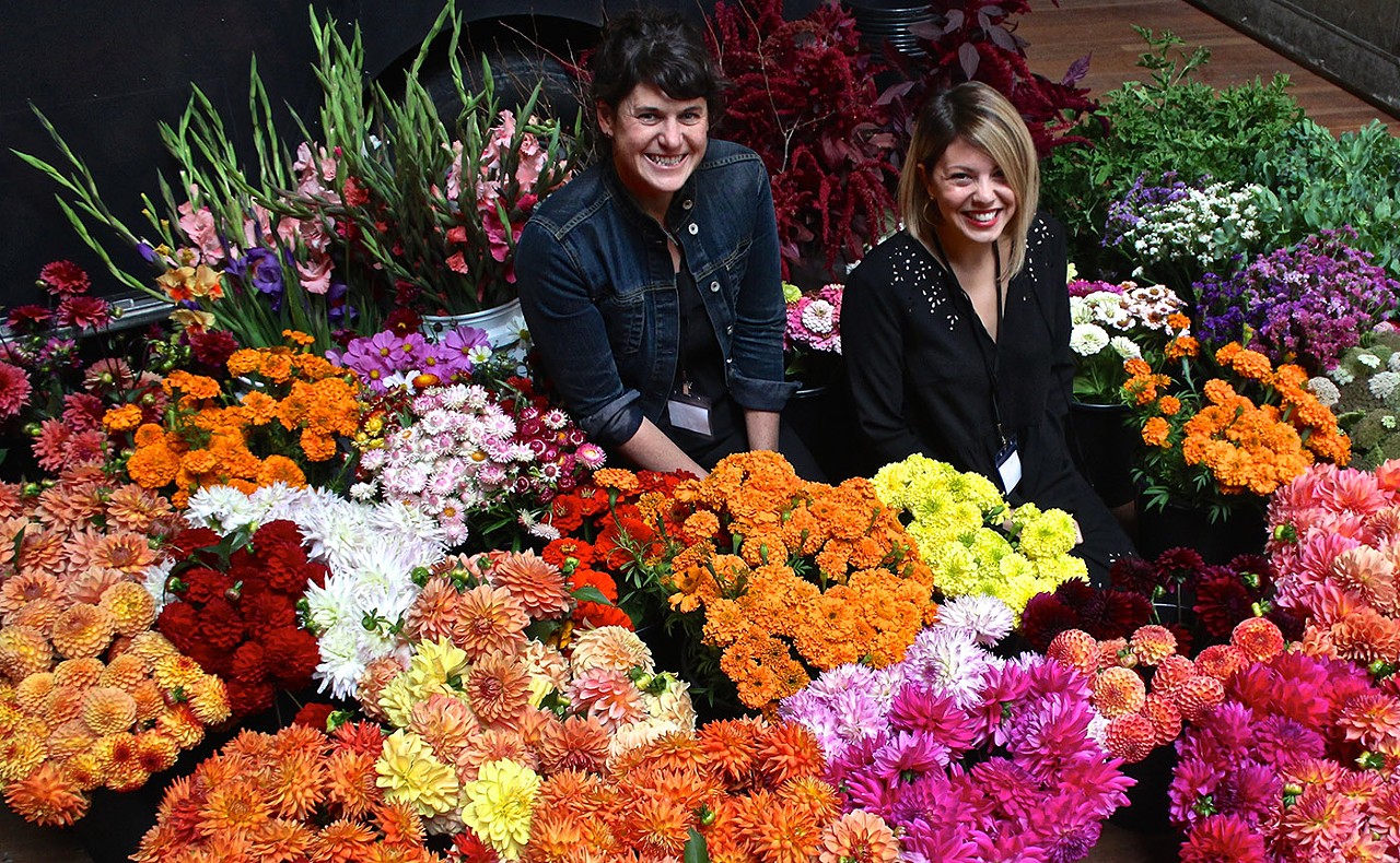 Flower Week organizers Lisa Waud (left) and Haley Lertola.