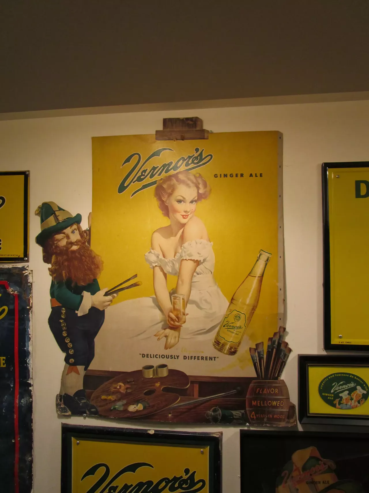 There's something cheeky about this promotional piece. The comely blonde with the exposed shoulders has a come-hither stare, but the artist is the gnome himself, offering a devilish wink. Wunderlich says one Vernor's Club member bears the woman's likeness as a tattoo.