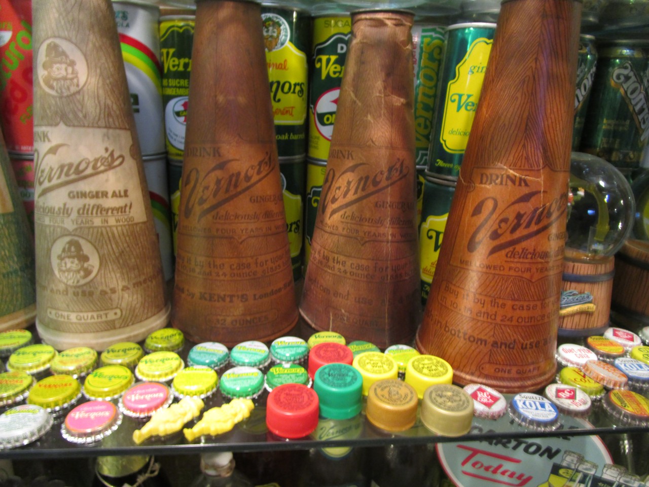 Here are cans, bottlecaps, and promotional bottle-holders that doubled as megaphones.