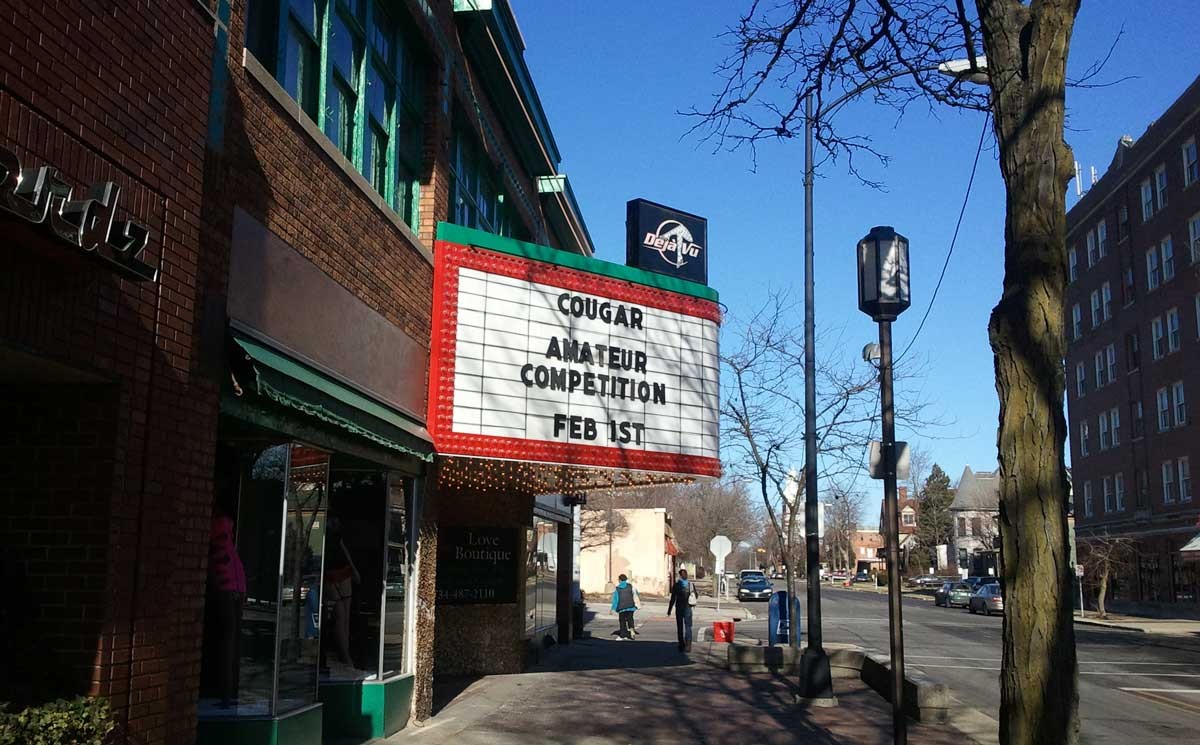 A sign at Ypsilanti’s Deja Vu Showgirls advertising a “cougar amateur competition.”