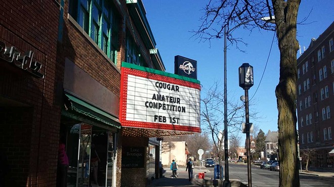 A sign at Ypsilanti’s Deja Vu Showgirls advertising a “cougar amateur competition.”