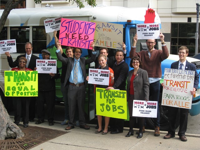 All aboard: Mass transit activists show their support in Lansing.