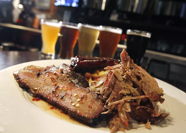 "Combo Platter" with smoked brisket, pulled pork, and bock-braised baby-back ribs from Blue Tractor in Ann Arbor. - MT photo: Rob Widdis