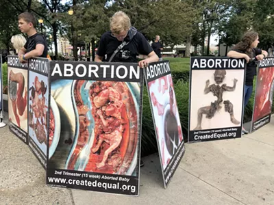 Created Equal protesters.