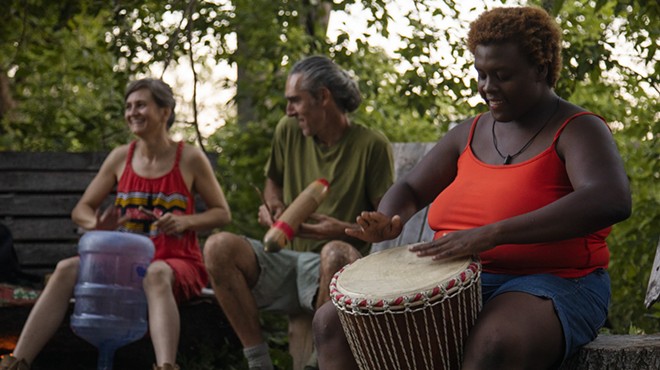 A jam session in Circle Forest. Andrew "Birch" Kemp (center) founded Arboretum Detroit in 2019.