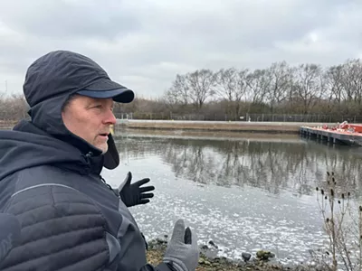 Scott Whitney, of the Army Corps of Engineers, is on the banks of Des Plaines River. This area will be the first stage of construction on the Brandon Road Interbasin Project.