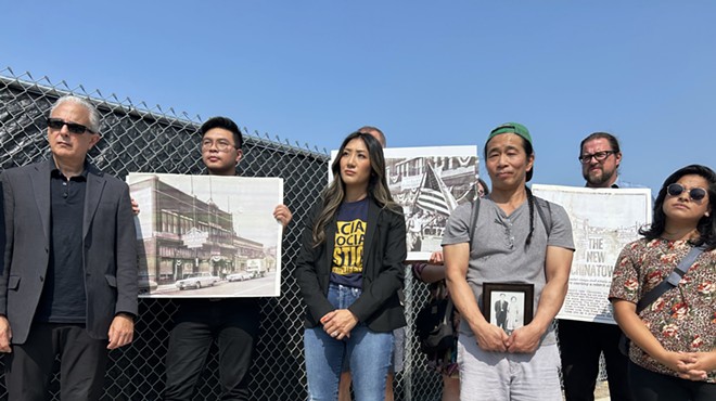 Asian Americans and preservationists mourn the demolition of a 140-year-old building in Detroit's old Chinatown neighborhood in the Cass Corridor.