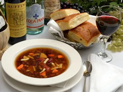 Roman Village’s minestrone. By the way, have you heard the one about the old guy who wandered into a red-light district and saw some storefront signage that read, “Super Sex”? When asked what he was looking for, announced, “If those are my choices, I’ll have the Soup!”