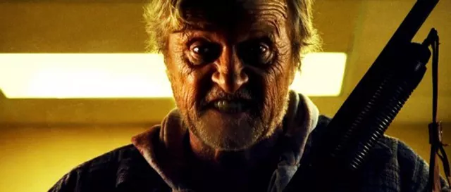 Badass: Rutger Hauer is a hobo with a shotgun.